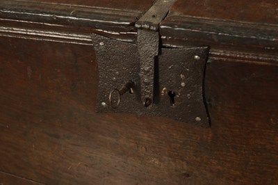 Lot 834 - A LARGE EARLY 17TH CENTURY OAK SIX PLANK COFFER
