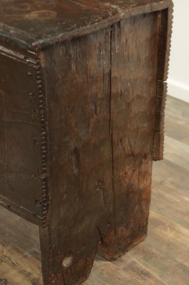 Lot 834 - A LARGE EARLY 17TH CENTURY OAK SIX PLANK COFFER