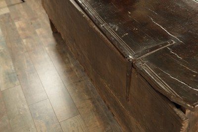 Lot 834 - A LARGE EARLY 17TH CENTURY OAK SIX PLANK COFFER