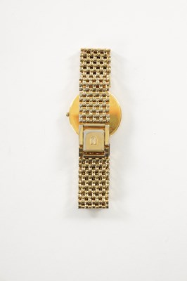 Lot 509 - A VINTAGE GOLD PLATED UNIVERSAL-GENEVE WRISTWATCH