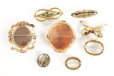 Lot 455 - A COLLECTION OF EIGHT 19TH CENTURY GILT METAL BROOCHES