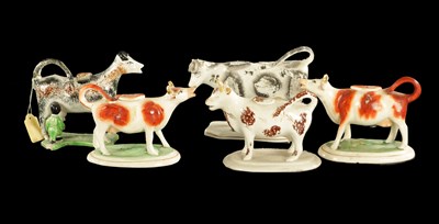 Lot 85 - A COLLECTION OF LATE 19TH CENTURY STAFFORDSHIRE POTTERY COW CREAMERS