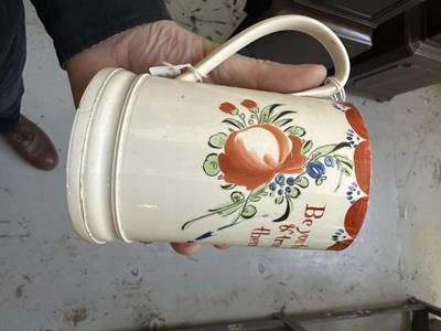 Lot 141 - A LATE 18TH CENTURY LEEDS CREAMWARE MUG 'BE YOU TO ALL MANKIND'