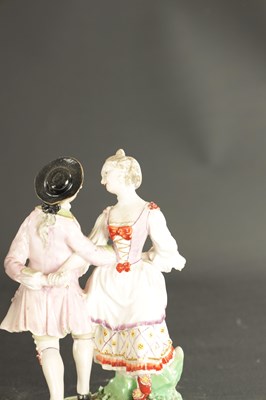 Lot 81 - A LATE 18TH CENTURY PAIR OF CHELSEA DERBY PORCELAIN FIGURES CARRYING BASKETS