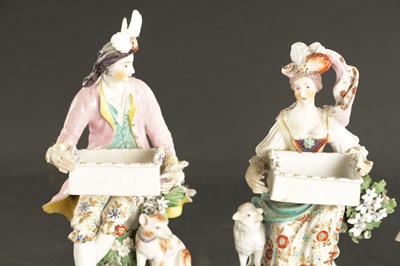 Lot 81 - A LATE 18TH CENTURY PAIR OF CHELSEA DERBY PORCELAIN FIGURES CARRYING BASKETS