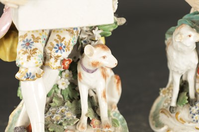 Lot 81 - A LATE 18TH CENTURY PAIR OF CHELSEA DERBY PORCELAIN FIGURES CARRYING BASKETS