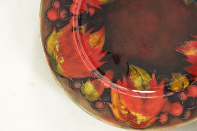 Lot 84 - A PAIR OF 1930/40'S W MOORCROFT PLATES AND ANOTHER