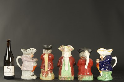 Lot 109 - A COLLECTION OF FIVE MID 19TH CENTURY STAFFORDSHIRE TOBY JUGS