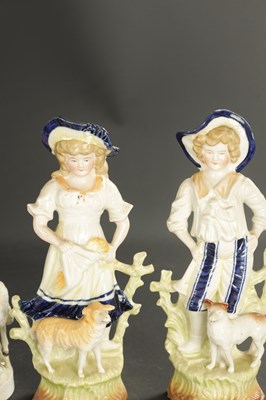Lot 86 - A PAIR OF LATE 19TH CENTURY ROYAL DUX FIGURES OF BOYS