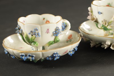 Lot 34 - THREE MID 19TH CENTURY MEISSEN PORCELAIN CUP AND SAUCERS