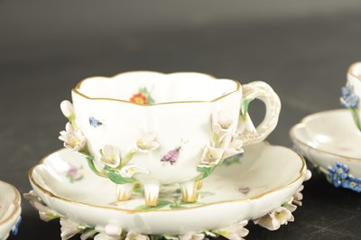 Lot 34 - THREE MID 19TH CENTURY MEISSEN PORCELAIN CUP AND SAUCERS