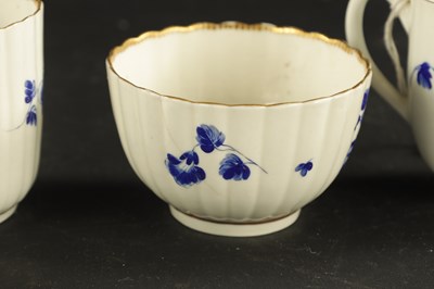 Lot 173 - A WORCESTER PORCELAIN FLUTED TRIO DECORATED WITH DRY BLUE FLOWERS CIRCA 1775