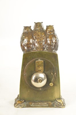 Lot 1001 - TIFFANY & CO. A STYLISH ARTS AND CRAFTS GREEN AND BROWN BRONZE PATINATED TRIPLE OWL MANTEL CLOCK