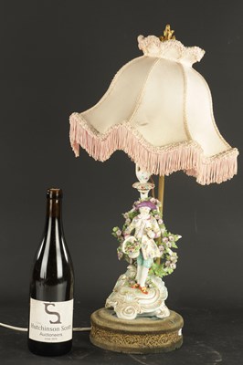 Lot 73 - A FRENCH PORCELAIN LAMP FIGURE