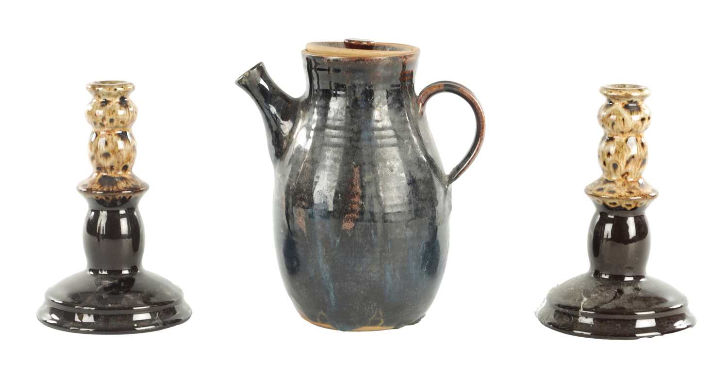 Lot 117 - A PAIR OF 19TH CENTURY SLIPWARE CANDLESTICKS AND MATCHING JUG