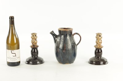Lot 117 - A PAIR OF 19TH CENTURY SLIPWARE CANDLESTICKS AND MATCHING JUG
