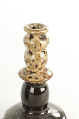 Lot 117 - A PAIR OF 19TH CENTURY SLIPWARE CANDLESTICKS AND MATCHING JUG