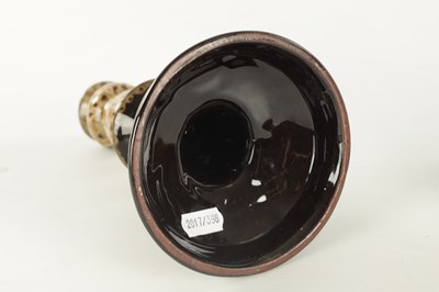 Lot 117 - A PAIR OF 19TH CENTURY SLIPWARE CANDLESTICKS AND MATCHING JUG