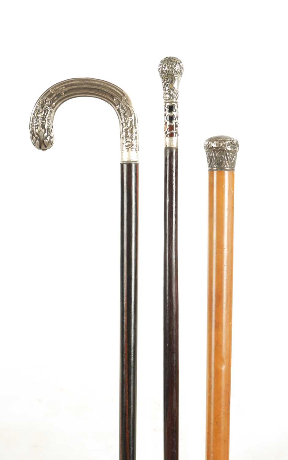 Lot 621 - A COLLECTION OF THREE EARLY 20TH CENTURY SILVER MOUNTED WALKING STICKS