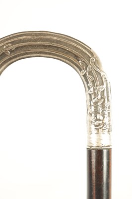 Lot 621 - A COLLECTION OF THREE EARLY 20TH CENTURY SILVER MOUNTED WALKING STICKS