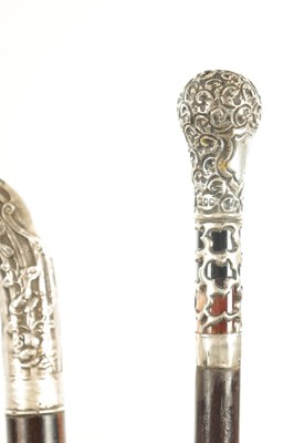 Lot 621 - A COLLECTION OF THREE EARLY 20TH CENTURY SILVER MOUNTED WALKING STICKS