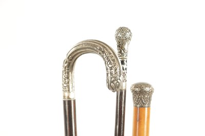 Lot 621 - A COLLECTION OF THREE EARLY 20TH CENTURY SILVER MOUNTED WALKING STICKS