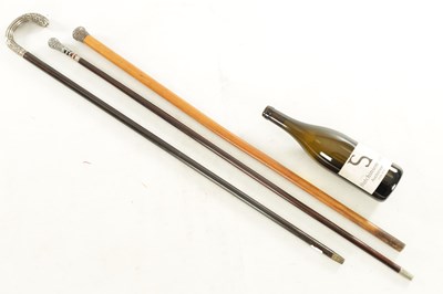 Lot 621 - A COLLECTION OF THREE EARLY 20TH CENTURY SILVER MOUNTED WALKING STICKS