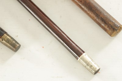 Lot 621 - A COLLECTION OF THREE EARLY 20TH CENTURY SILVER MOUNTED WALKING STICKS