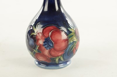 Lot 44 - A WALTER MOORCROFT ANEMONE PATTERN BULBOUS VASE