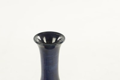 Lot 44 - A WALTER MOORCROFT ANEMONE PATTERN BULBOUS VASE
