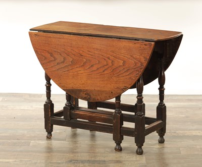 Lot 1334 - AN EARLY 18TH CENTURY JOINED ELM AND OAK GATELEG TABLE