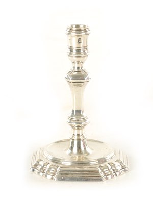 Lot 398 - A GEORGE II CAST SILVER TAPERSTICK