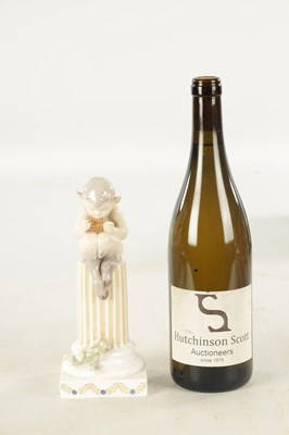 Lot 36 - AN EARLY 20TH CENTURY ROYAL COPENHAGEN FIGURE MODELLED AS FAUN ON COLUMNS WITH LIZARD