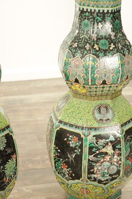 Lot 133 - AN IMPRESSIVE PAIR OF 19TH CENTURY CHINESE FAMILLE NOIRE DOUBLE GOURD HALL VASES