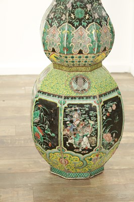 Lot 133 - AN IMPRESSIVE PAIR OF 19TH CENTURY CHINESE FAMILLE NOIRE DOUBLE GOURD HALL VASES