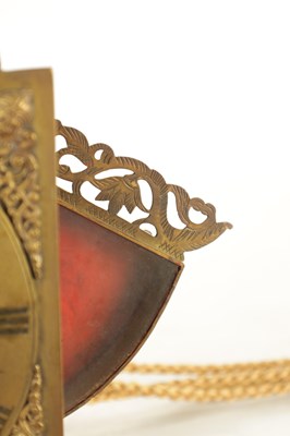 Lot 1067 - A LATE 17TH CENTURY BRASS WINGED LANTERN HOOK AND SPIKE WALL CLOCK
