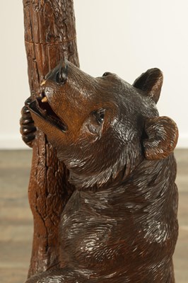 Lot 1219 - A GOOD 19TH CENTURY CARVED LINDEN WOOD BLACK FOREST BEAR HAT AND COAT STAND