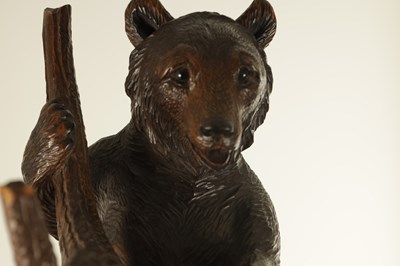 Lot 1219 - A GOOD 19TH CENTURY CARVED LINDEN WOOD BLACK FOREST BEAR HAT AND COAT STAND