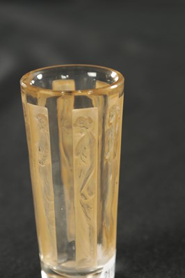 Lot 7 - A RENE LALIQUE SEPIA STAINED SIX FIGURINE SHOT GLASS
