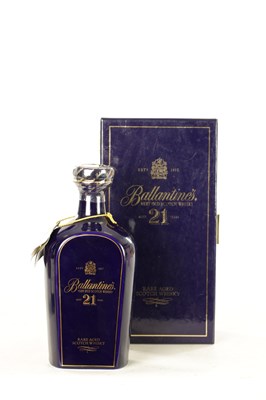 Lot 490 - A 21 YEAR OLD BALLANTINE’S RARE AGED SCOTCH WHISKY IN WADE PORCELAIN DECANTER