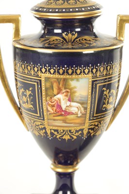 Lot 32 - A 19TH CENTURY VIENNA PORCELAIN TWO HANDLED LIDDED URN SHAPED VASE ON PEDESTAL