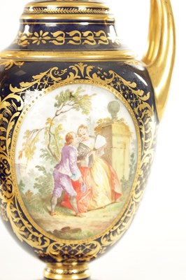 Lot 59 - A PAIR OF 19TH CENTURY VIENNA PORCELAIN RICHLY GILT AND ROYAL BLUE TWO HANDLED COVERED VASES