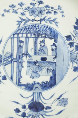 Lot 95 - A PAIR OF LARGE CHINESE QING DYNASTY BLUE AND WHITE PORCELAIN CHARGERS