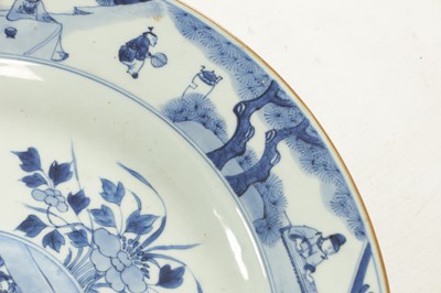 Lot 95 - A PAIR OF LARGE CHINESE QING DYNASTY BLUE AND WHITE PORCELAIN CHARGERS