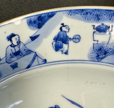 Lot 95 - A PAIR OF LARGE CHINESE QING DYNASTY BLUE AND WHITE PORCELAIN CHARGERS