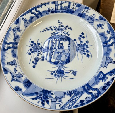 Lot 95 - A PAIR OF LARGE CHINESE QING DYNASTY BLUE AND WHITE PORCELAIN CHARGERS