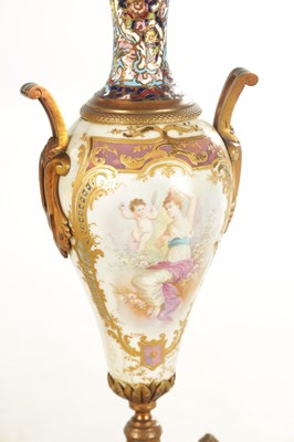 Lot 1008 - A FINE LATE 19TH CENTURY FRENCH ORMOLU PORCELAIN AND CHAMPLEVE ENAMELLED THREE PEICE CLOCK GUARNITURE