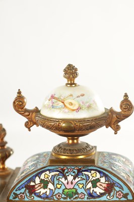 Lot 1008 - A FINE LATE 19TH CENTURY FRENCH ORMOLU PORCELAIN AND CHAMPLEVE ENAMELLED THREE PEICE CLOCK GUARNITURE