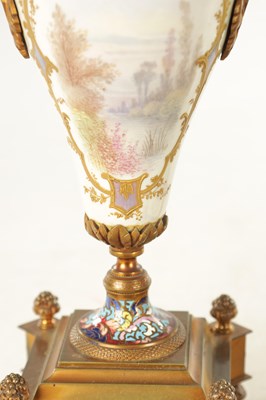 Lot 1008 - A FINE LATE 19TH CENTURY FRENCH ORMOLU PORCELAIN AND CHAMPLEVE ENAMELLED THREE PEICE CLOCK GUARNITURE