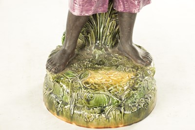Lot 58 - A LARGE EARLY 20TH CENTURY MAJOLICA FIGURAL SCULPTOR